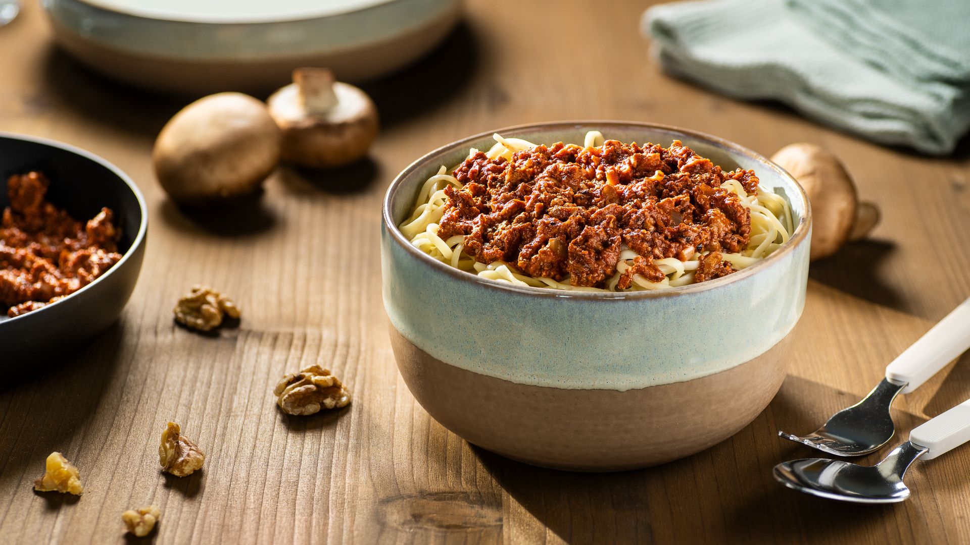 Walnut Bolognese with pasta in a bowl